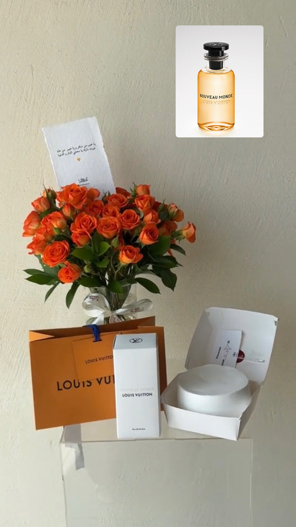 عطر LV مع فازة برتقالية وكيكة