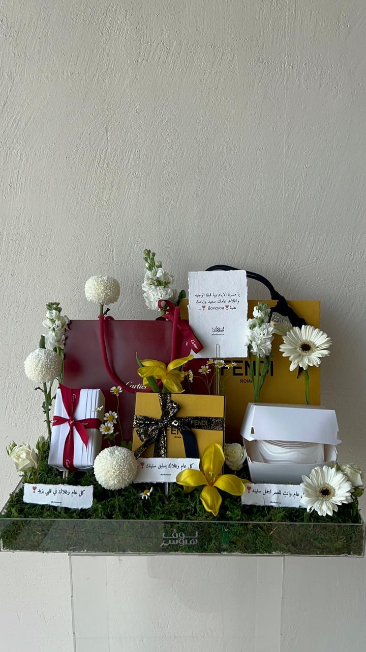 cartier , fendi عطر وعقد وكيك من