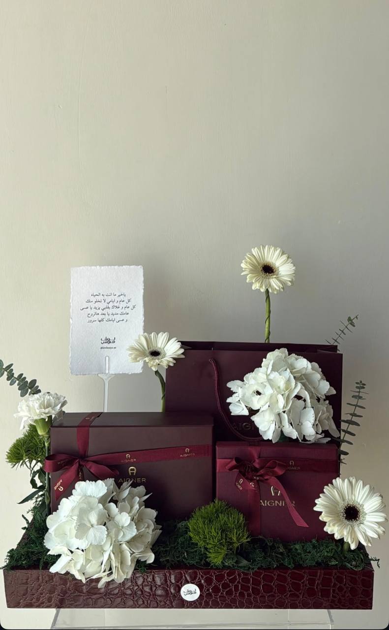 Aigner  قلم وبوك