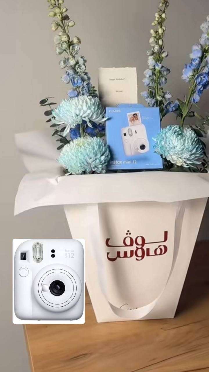 Instax mini 12 كاميرا