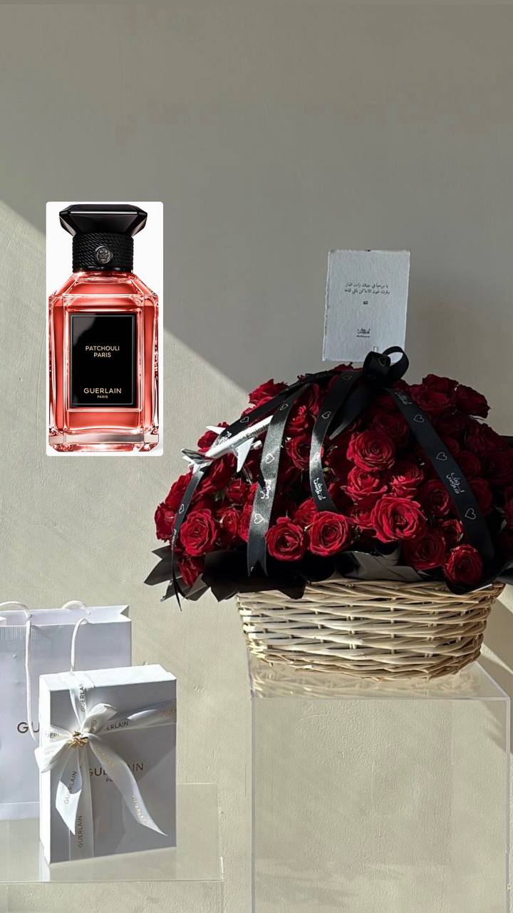 L مع سلة حمراء وطيارة الامارات Guerlain عطر