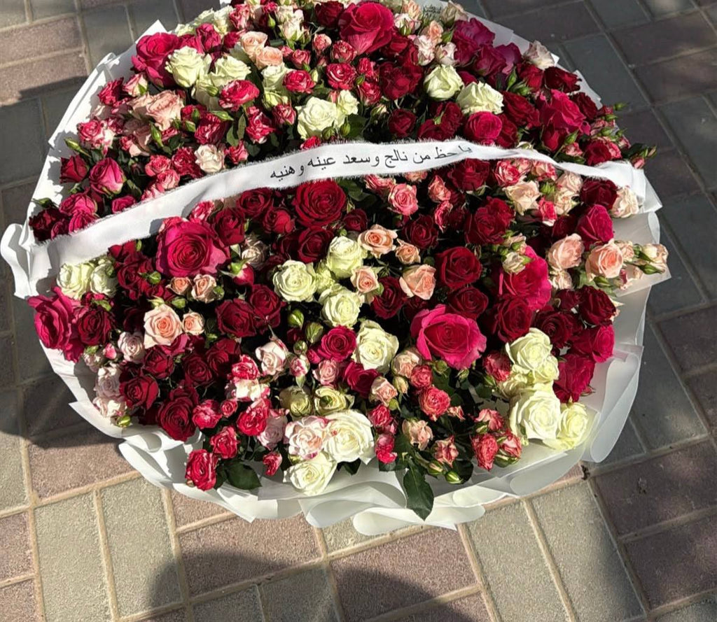 باقةكبيرة مع شريطة يا حظ من نالج