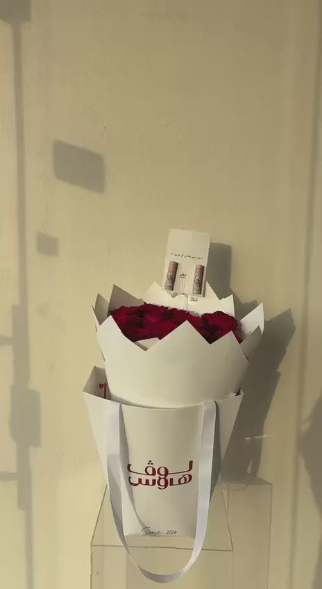 باقة حمراء مع 200 كاش