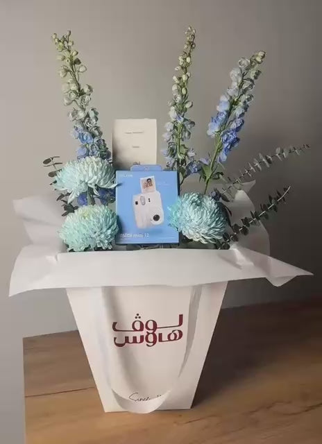 Instax mini 12 كاميرا